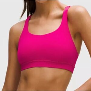 NWOT Lululemon Athletica Energy Bra Medium Support B-D cups. Size 14. Pink